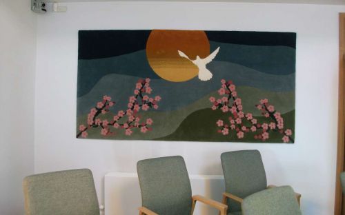 Hand tufted wall hanging in church